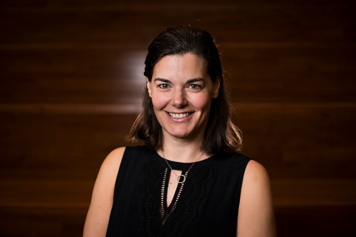 portrait of alison davis wearing a black sleeveless shirt