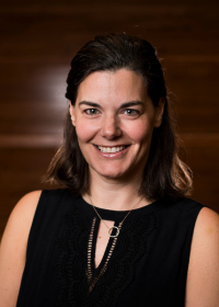portrait of alison davis wearing a black sleeveless shirt
